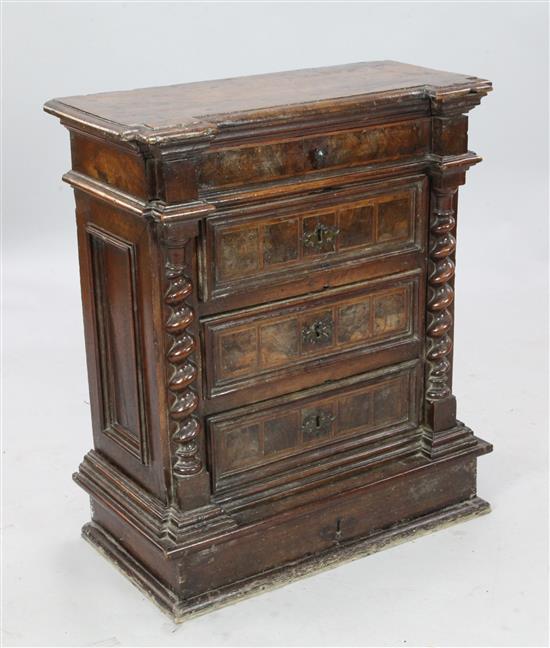 An early 18th century Tuscan banded walnut chest, W. 2ft 3in. D. 1ft 1in. H. 2ft 7in.